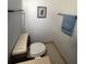 Simple bathroom with a toilet and towel rack, and tile floors at 6268 Palma Del Mar S Blvd # 407, St Petersburg, FL 33715