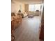 Bright living room with dining area and hardwood floors at 6268 Palma Del Mar S Blvd # 407, St Petersburg, FL 33715