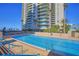 Refreshing pool area with plenty of lounge chairs for relaxation at 1560 Gulf Blvd # 1107, Clearwater Beach, FL 33767