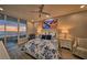 Bright bedroom features a comfortable bed and stunning ocean views at 1560 Gulf Blvd # 1107, Clearwater Beach, FL 33767