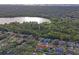 Property near a lake with lush green surroundings at 2502 Indigo Dr, Dunedin, FL 34698