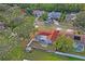 House with a pool, seen from an aerial perspective at 2502 Indigo Dr, Dunedin, FL 34698