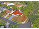 Single-story home on a corner lot, aerial view at 2502 Indigo Dr, Dunedin, FL 34698