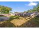 Fenced backyard with grassy area, providing ample outdoor space at 2502 Indigo Dr, Dunedin, FL 34698