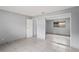 Bright bedroom featuring mirrored closet doors at 2502 Indigo Dr, Dunedin, FL 34698