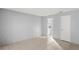 Bedroom with tile floor and access to bathroom at 2502 Indigo Dr, Dunedin, FL 34698