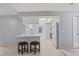 Kitchen with breakfast bar and two dark brown stools at 2502 Indigo Dr, Dunedin, FL 34698