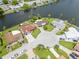 Aerial view of waterfront community with circular street at 4145 Star Island Dr, Holiday, FL 34691