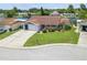 Single-Gathering home with well-manicured lawn and canal views at 4145 Star Island Dr, Holiday, FL 34691