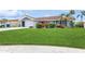Single story home with well maintained lawn at 4145 Star Island Dr, Holiday, FL 34691