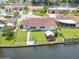 House with canal access and lush landscaping at 4145 Star Island Dr, Holiday, FL 34691