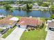 Aerial view of single-Gathering home on waterfront lot at 4145 Star Island Dr, Holiday, FL 34691