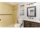Bathroom with walk-in shower, tile surround, and vanity at 4145 Star Island Dr, Holiday, FL 34691