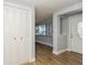 Entryway with tile floors, white closet and living room view at 4145 Star Island Dr, Holiday, FL 34691