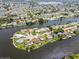 Wide aerial showcasing waterfront homes and community at 4145 Star Island Dr, Holiday, FL 34691