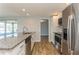 Modern kitchen with granite countertops and stainless steel appliances at 4145 Star Island Dr, Holiday, FL 34691