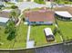 Single-story home with canal-front yard and walkway at 4145 Star Island Dr, Holiday, FL 34691
