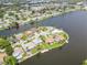 Aerial view showcasing a house on a private island at 4145 Star Island Dr, Holiday, FL 34691