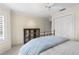 Bright bedroom with double doors leading to a closet at 2901 Leprechaun Ln, Palm Harbor, FL 34683