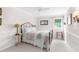 Bright bedroom with a metal bed frame and window at 2901 Leprechaun Ln, Palm Harbor, FL 34683