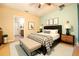 Bright bedroom with colorful walls, modern furniture, ensuite bathroom, and ample natural light at 105 Cascade Bend Dr, Ruskin, FL 33570