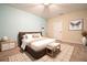 Cozy bedroom with warm tones, featuring a comfortable bed and complementary furnishings at 105 Cascade Bend Dr, Ruskin, FL 33570