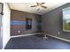 Functional home gym featuring rubber flooring, exercise equipment, and motivating wall art at 105 Cascade Bend Dr, Ruskin, FL 33570