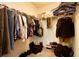 Spacious walk-in closet featuring custom shelving and ample storage for clothes and shoes at 105 Cascade Bend Dr, Ruskin, FL 33570