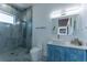 Bathroom with a stylish vanity, vessel sink, and rainfall shower at 2121 Bayou Grande Ne Blvd, St Petersburg, FL 33703