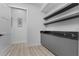 Hallway featuring a cabinet with marble countertops at 2121 Bayou Grande Ne Blvd, St Petersburg, FL 33703