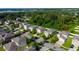 Aerial view showcasing a house's location within a neighborhood at 105 Cascade Bend Dr, Ruskin, FL 33570
