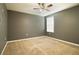 Spacious bedroom with ceiling fan and neutral wall colors at 105 Cascade Bend Dr, Ruskin, FL 33570