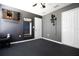 Home gym with mirror and various exercise equipment at 105 Cascade Bend Dr, Ruskin, FL 33570