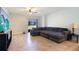 Gathering room featuring a sectional sofa and large TV at 105 Cascade Bend Dr, Ruskin, FL 33570