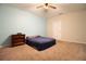 Bright bedroom with a double bed and a dresser at 105 Cascade Bend Dr, Ruskin, FL 33570