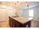 Open concept kitchen with island and breakfast bar at 105 Cascade Bend Dr, Ruskin, FL 33570