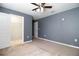 Bright bedroom with walk-in closet and neutral decor at 105 Cascade Bend Dr, Ruskin, FL 33570