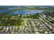 Aerial view of a house situated in a residential area at 105 Cascade Bend Dr, Ruskin, FL 33570