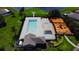 Community pool and playground area with shaded seating at 105 Cascade Bend Dr, Ruskin, FL 33570