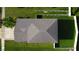 Overhead view of a house with a gray roof and a neatly landscaped yard at 105 Cascade Bend Dr, Ruskin, FL 33570
