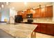 Modern kitchen with granite countertops and island at 105 Cascade Bend Dr, Ruskin, FL 33570