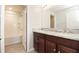 Bathroom with double vanity, granite countertop and tub at 105 Cascade Bend Dr, Ruskin, FL 33570