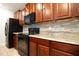 Modern kitchen with stainless steel appliances and granite countertops at 105 Cascade Bend Dr, Ruskin, FL 33570