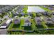 Aerial view of a house with a fenced backyard in a residential community at 105 Cascade Bend Dr, Ruskin, FL 33570