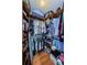 Spacious walk-in closet with ample shelving and hanging space at 2323 Feather Sound Dr # 202, Clearwater, FL 33762