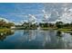 Serene pond with a fountain, providing a tranquil setting within the community at 2323 Feather Sound Dr # 202, Clearwater, FL 33762