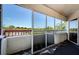 Spacious screened balcony offering scenic views at 2323 Feather Sound Dr # 202, Clearwater, FL 33762