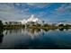 Beautiful reflection of the community buildings in a tranquil pond at 2323 Feather Sound Dr # 202, Clearwater, FL 33762