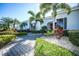 Community building exterior with landscaping at 2323 Feather Sound Dr # 202, Clearwater, FL 33762