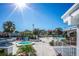 Relaxing pool and hot tub area with lounge chairs at 2323 Feather Sound Dr # 202, Clearwater, FL 33762